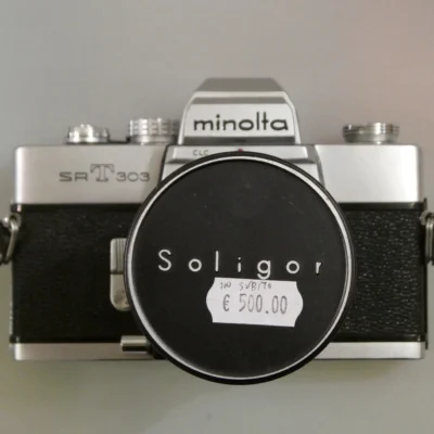 Minolta SRT303 con 135mm f2.8 usata garantita - Ottica Centrale Vicenza